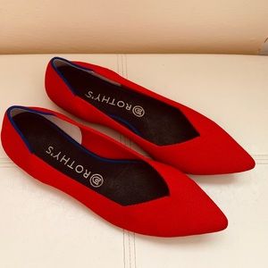 Pointed red Rothy’s flat shoes